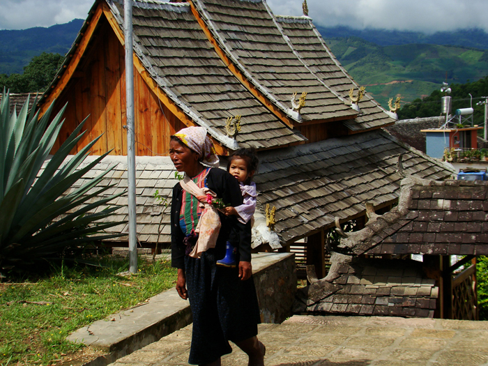 woman carrying child